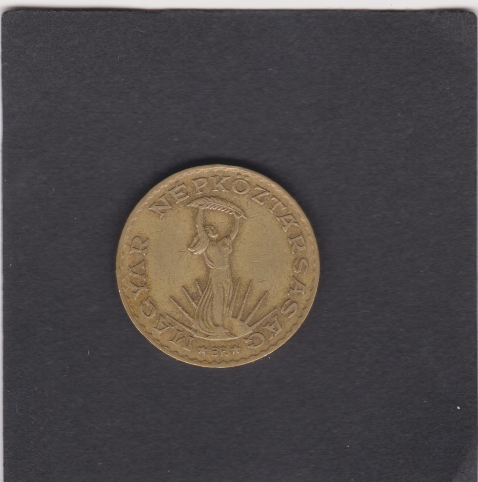 1986 - 10 Forint - Figura femminile con le braccia sollevate in alto che regge foglie di palma - Ungheria
