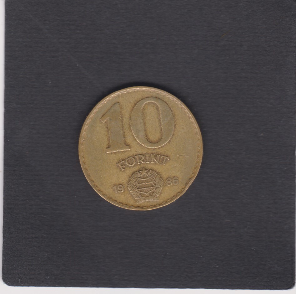 1986 - 10 Forint - Figura femminile con le braccia sollevate in alto che regge foglie di palma - Ungheria - immagine 2